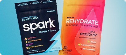 AdvoCare Spark & Rehydrate Variety Packs against a blue background.