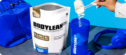 BodyLean25 Cookies n' Cream gusset bag sitting on a table while a hand pours a scoop into a Blue BodyLean25 shaker cup.